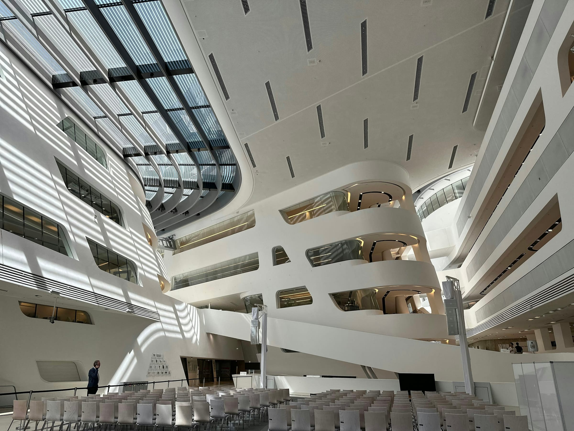 Modern congress centre atrium with rows of seating